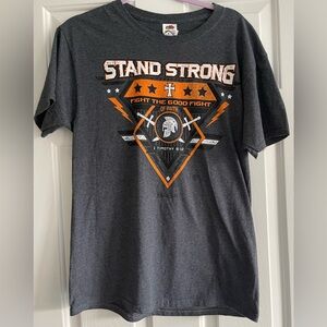 NWT Kerusso Christian Graphic Tee Shirt STAND STRONG 1 TIMOTHY 6:12 Size M